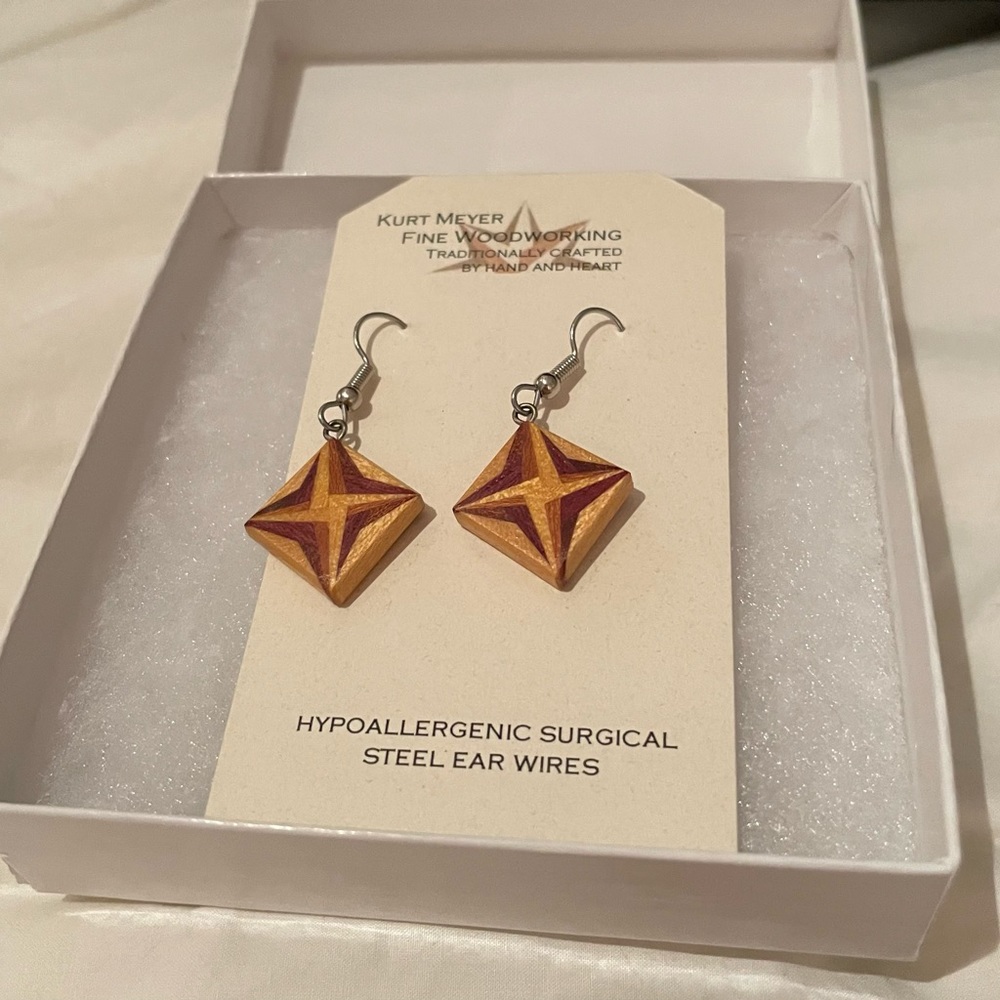 Pair of pierced dangle earrings